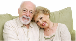 Smiling older couple at home